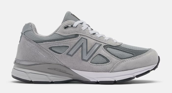 Side view of a grey New Balance shoe.